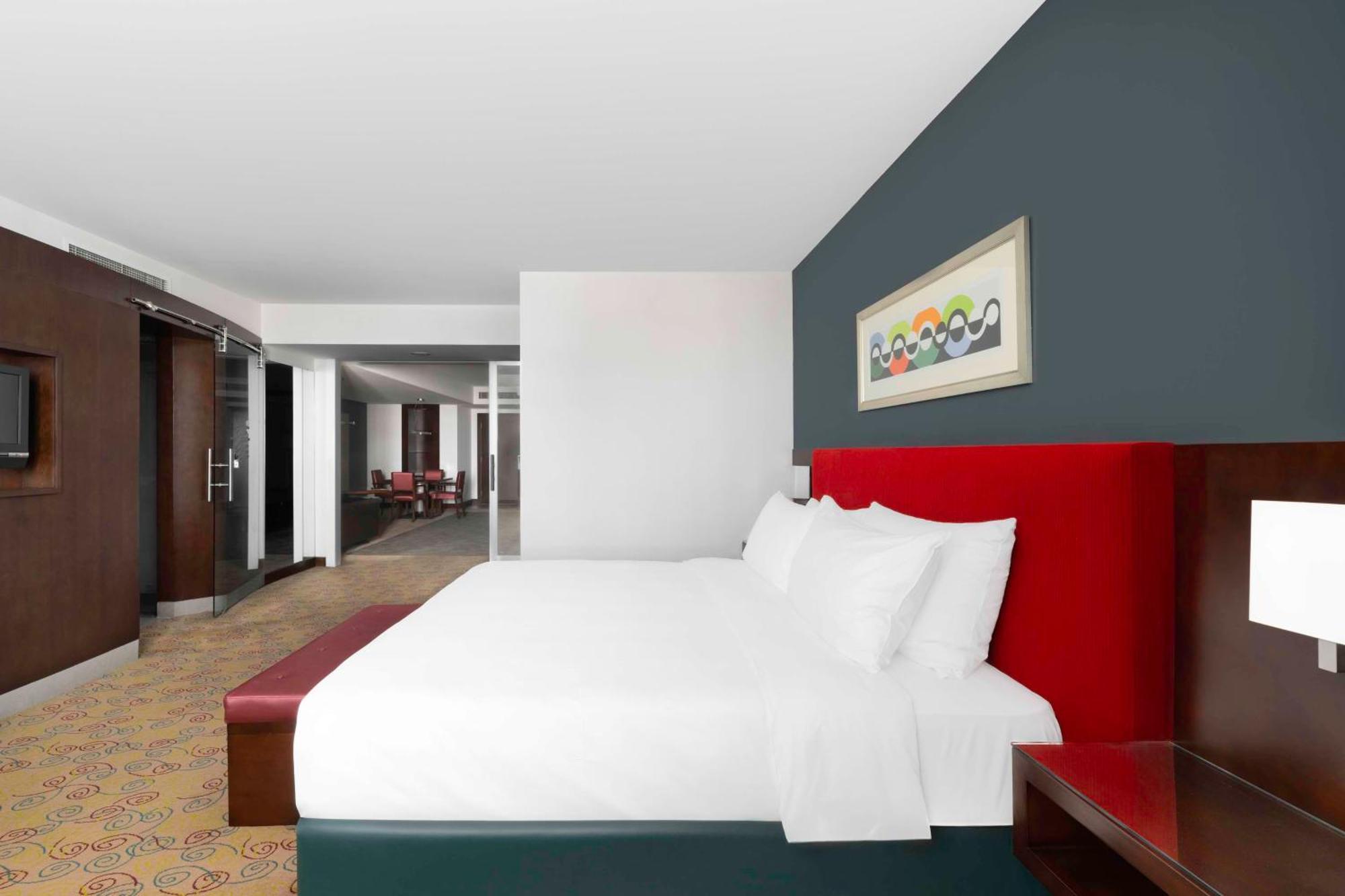 Radisson Blu Hotel, Riad Exterior foto A bedroom in the Olympic Village